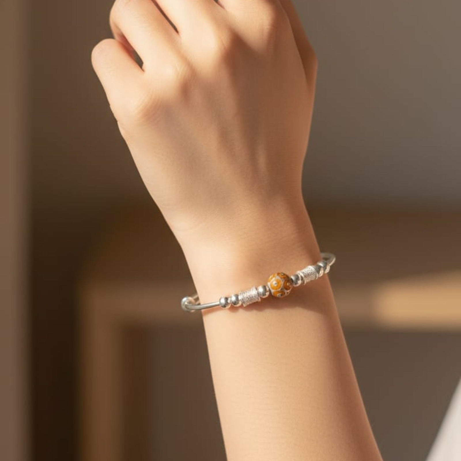 Silver Orange Bead Charm Bracelet