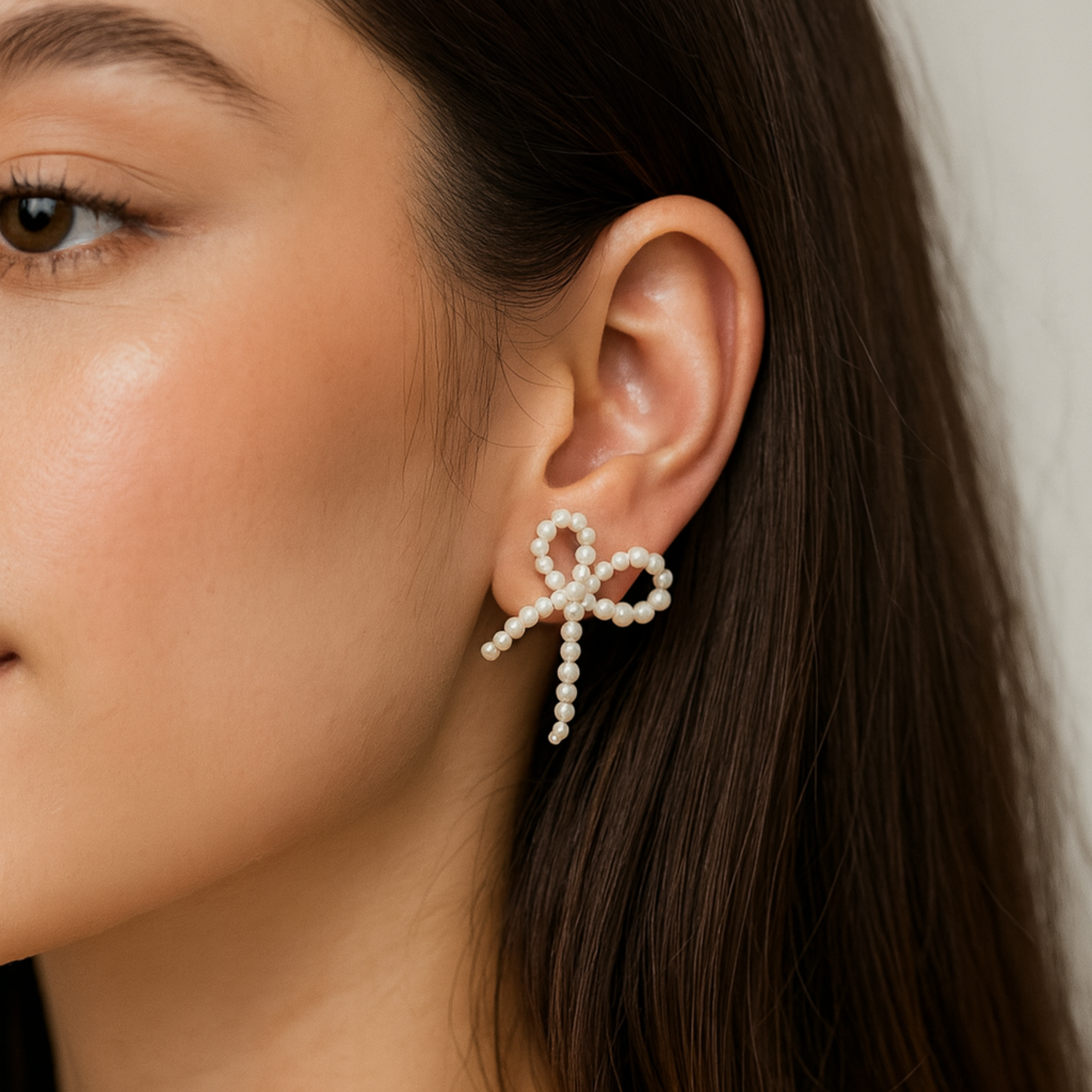 Pearl Bow Huggies Stud